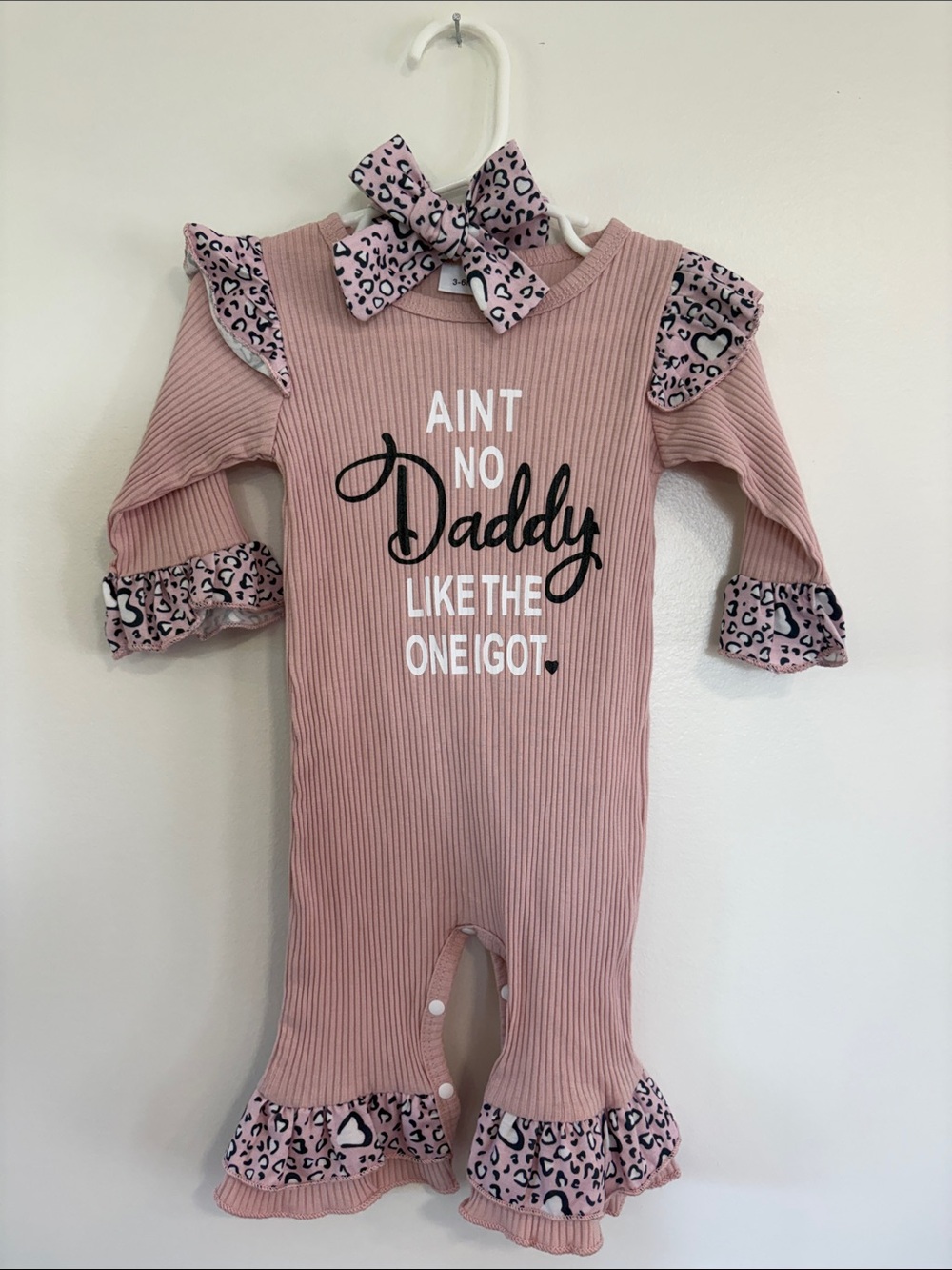 Pink Ribbed Baby One-Piece with Leopard Ruffle and 'Ain't No Daddy' Graphic